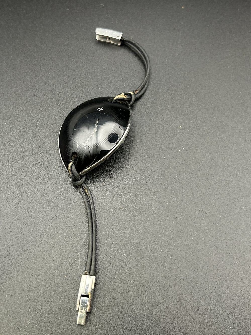 Calvin Klein ck K33233 Womens Watch Swiss Made Black Oval Cord Band Working
